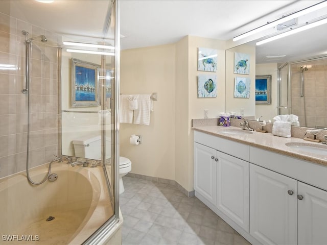 full bathroom with vanity, toilet, and separate shower and tub