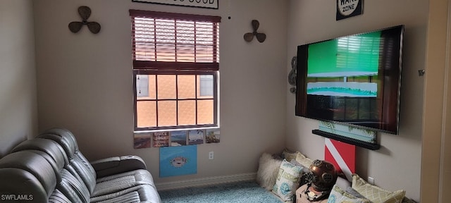 living area with carpet