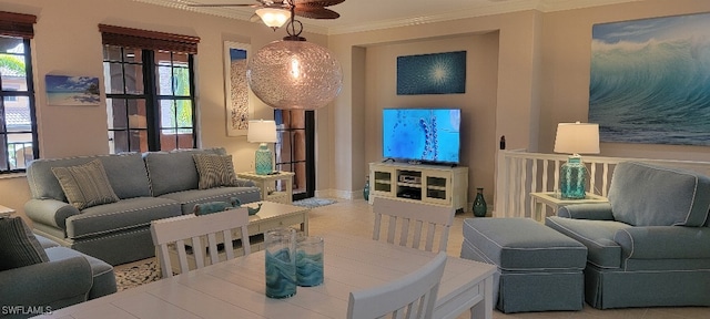 living room featuring ceiling fan and crown molding