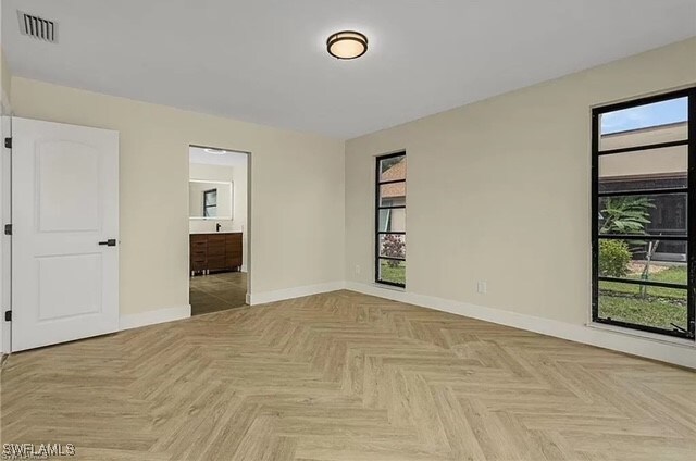 empty room featuring light parquet floors