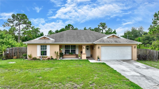 ranch-style home featuring a front yard and a garage