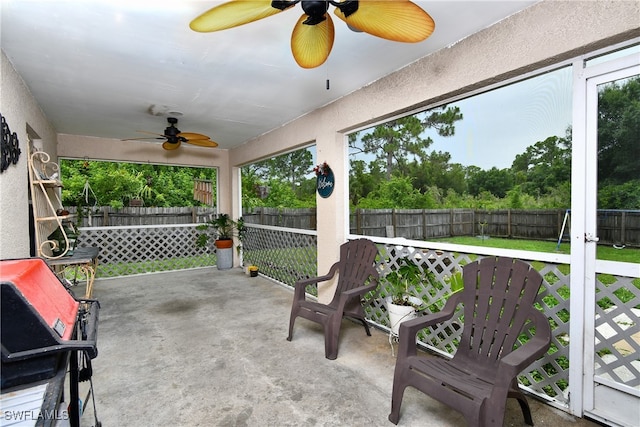 view of patio featuring ceiling fan