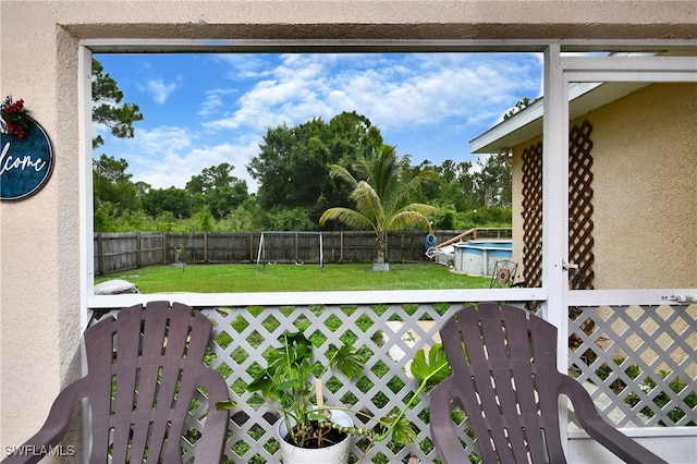 view of yard featuring a fenced in pool