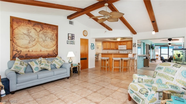 living room featuring lofted ceiling with beams and ceiling fan