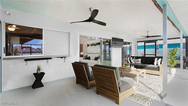 living room featuring concrete flooring