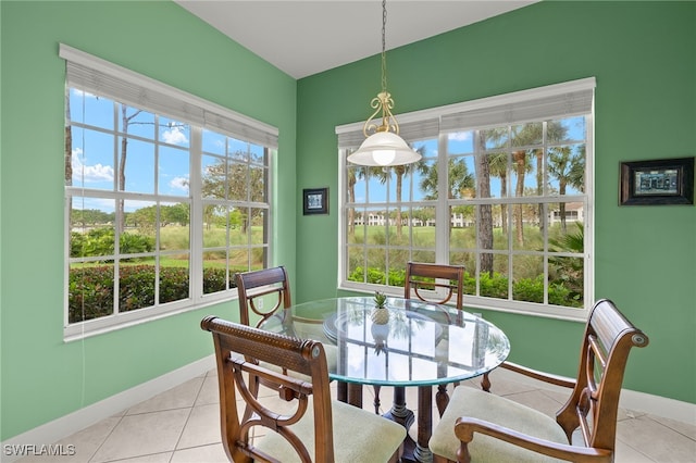 dining room with light tile patterned flooring