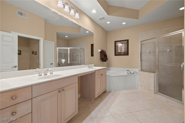 bathroom with vanity, tile patterned floors, and independent shower and bath