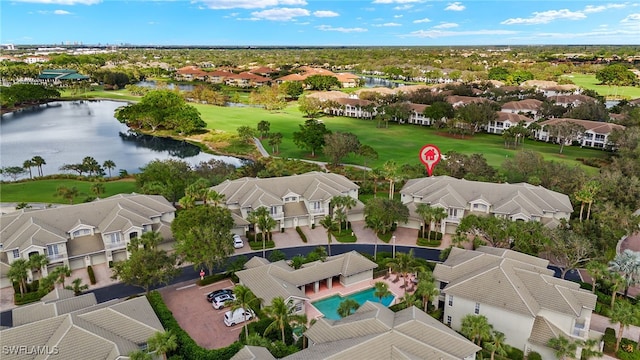 drone / aerial view featuring a water view