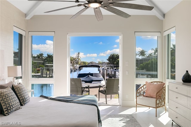 bedroom with vaulted ceiling with beams, a water view, and ceiling fan