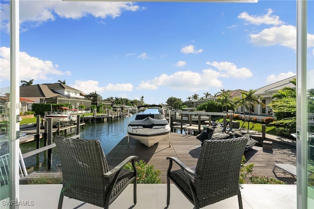 dock area featuring a water view