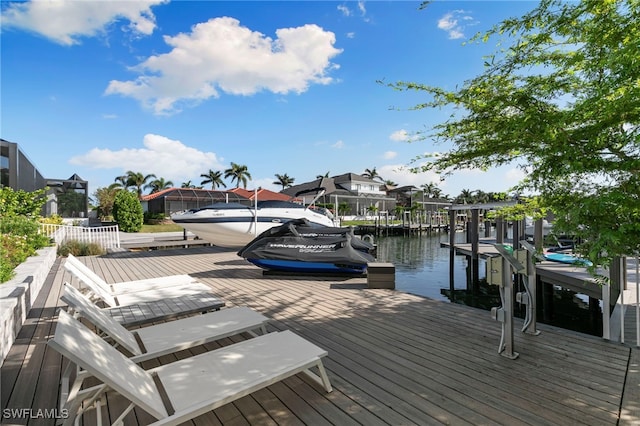 dock area with a water view