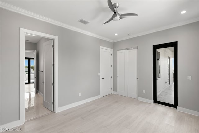 unfurnished bedroom featuring light hardwood / wood-style flooring, ornamental molding, french doors, and ceiling fan