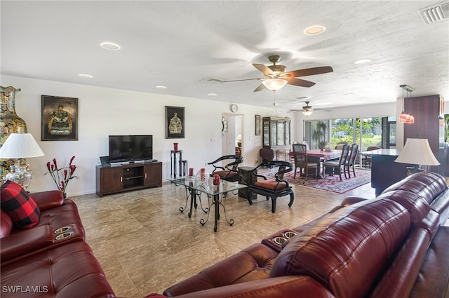 living room with ceiling fan