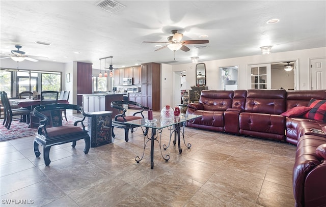 living room featuring ceiling fan