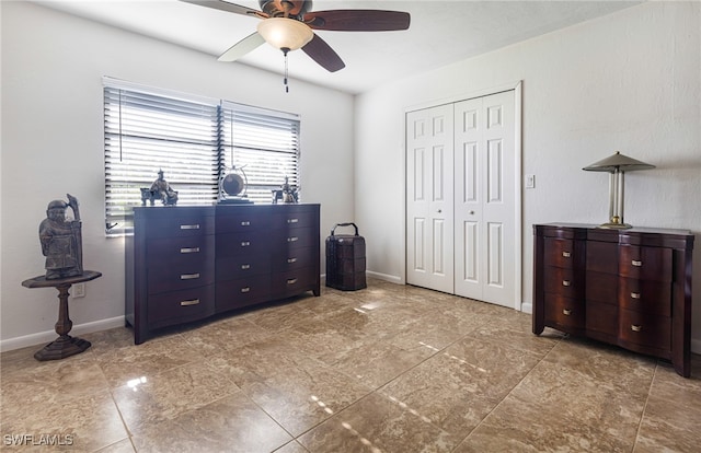 bedroom featuring a closet and ceiling fan