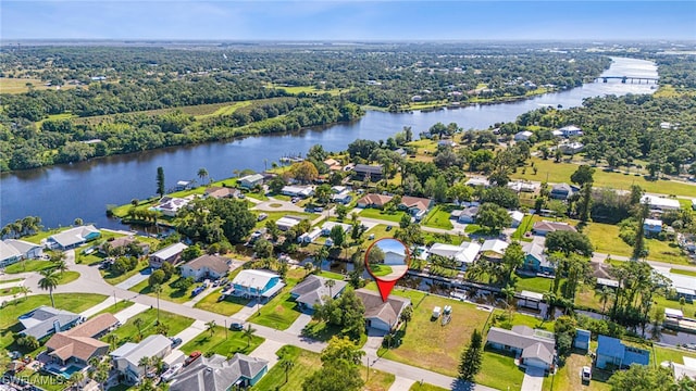 bird's eye view with a water view