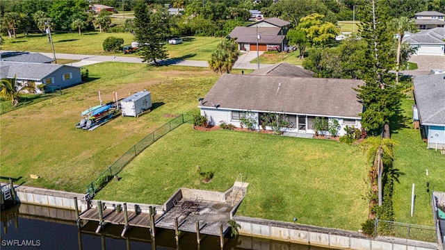 drone / aerial view featuring a water view