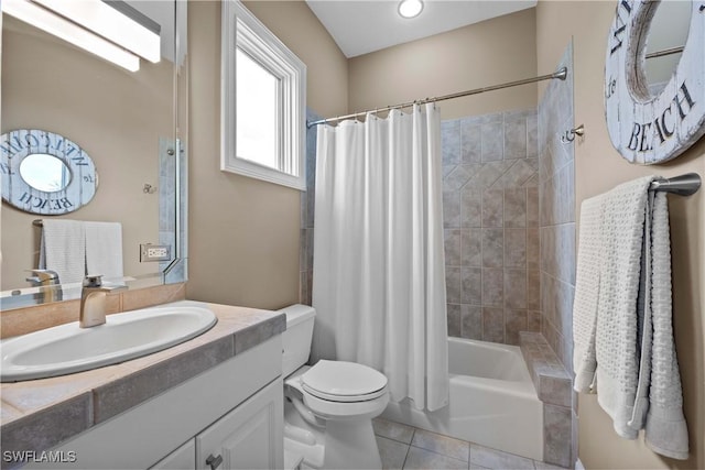 bathroom featuring shower / tub combo, tile patterned flooring, vanity, and toilet