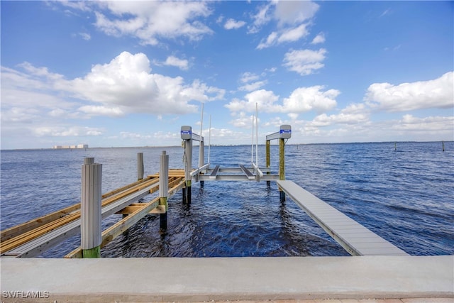 dock area featuring a water view and boat lift