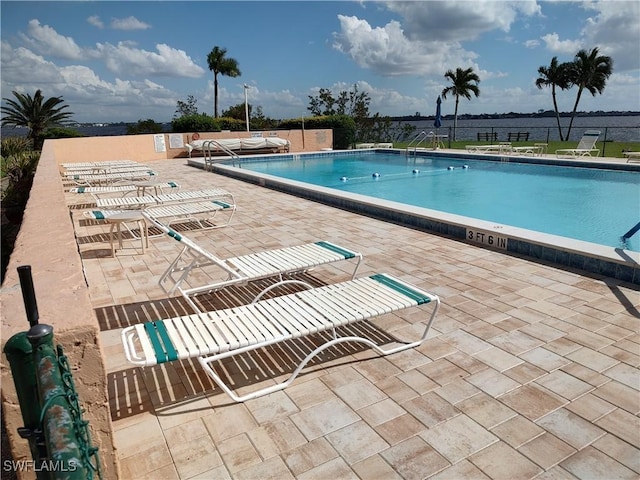 view of pool featuring a patio