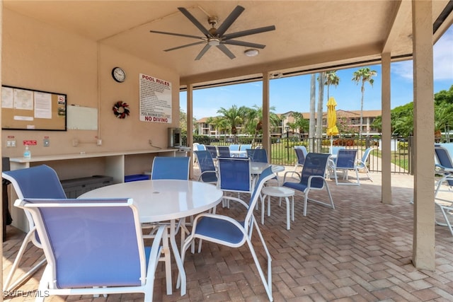 view of patio featuring ceiling fan