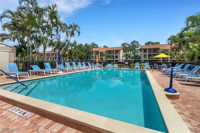 view of swimming pool with a patio area