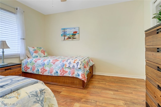 bedroom featuring light wood-type flooring