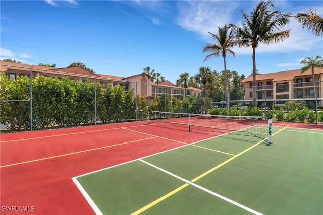 view of sport court featuring basketball hoop