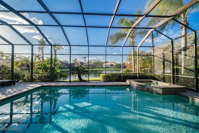 view of swimming pool featuring a lanai and an in ground hot tub