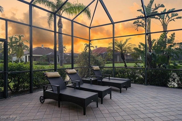 patio terrace at dusk with a lanai