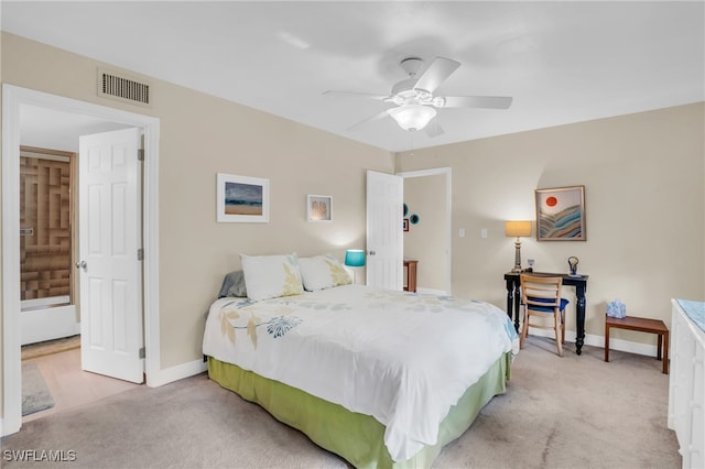 bedroom featuring ceiling fan and light colored carpet