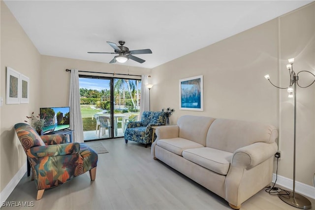 13663 Mcgregor Village Dr Unit 18, Fort Myers, FL 33919 - living area featuring ceiling fan, baseboards, and light wood finished floors