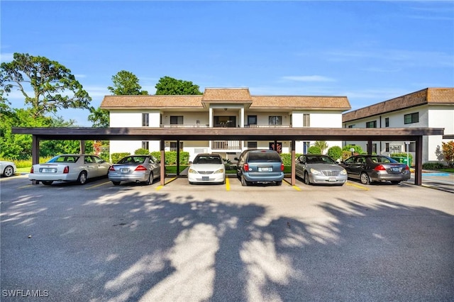 13663 Mcgregor Village Dr Unit 18, Fort Myers, FL 33919 - view of covered parking lot