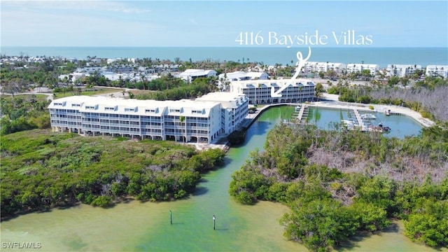 drone / aerial view featuring a water view