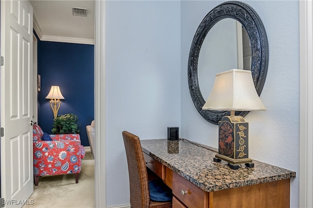 office with carpet floors and ornamental molding