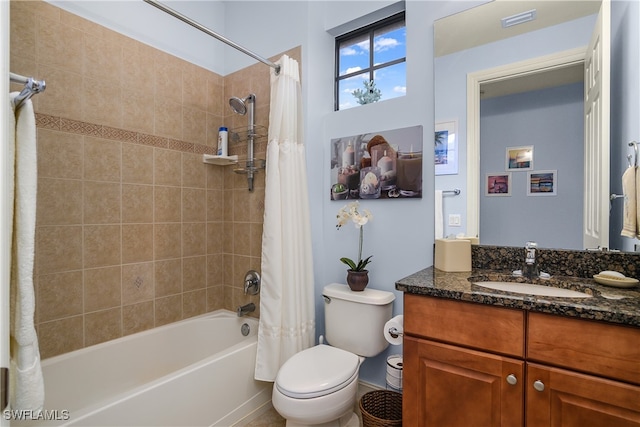 full bathroom with shower / tub combo, vanity, and toilet