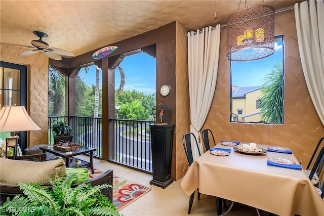 interior space featuring ceiling fan