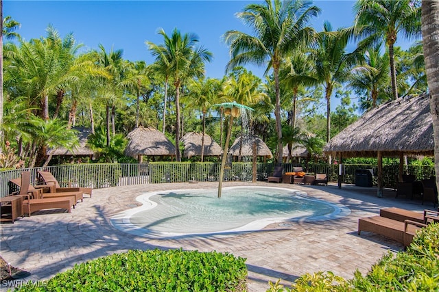 view of pool featuring a gazebo and a patio