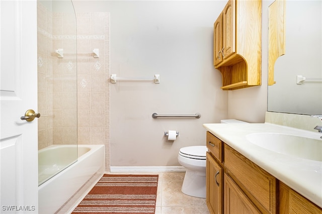 full bathroom with tile patterned floors, vanity, toilet, and tiled shower / bath combo