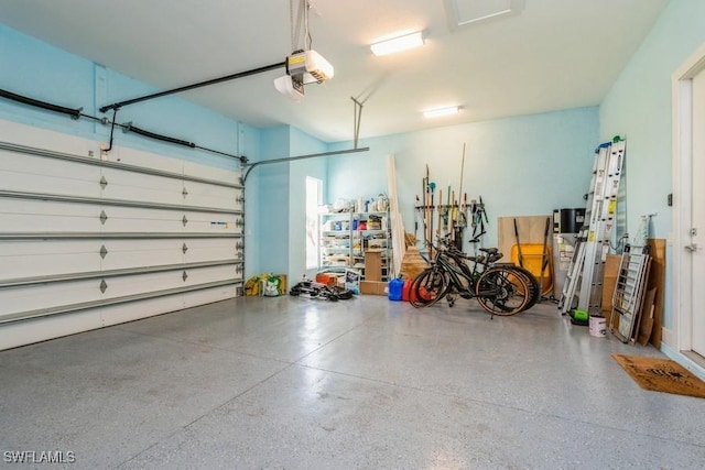 garage featuring a garage door opener