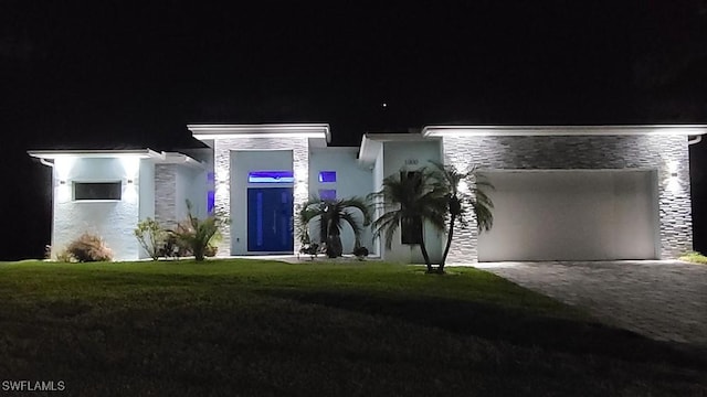 view of front of house with a lawn