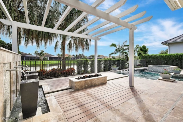 exterior space with a pergola, a water view, and a pool with hot tub