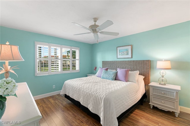 bedroom featuring hardwood / wood-style flooring and ceiling fan