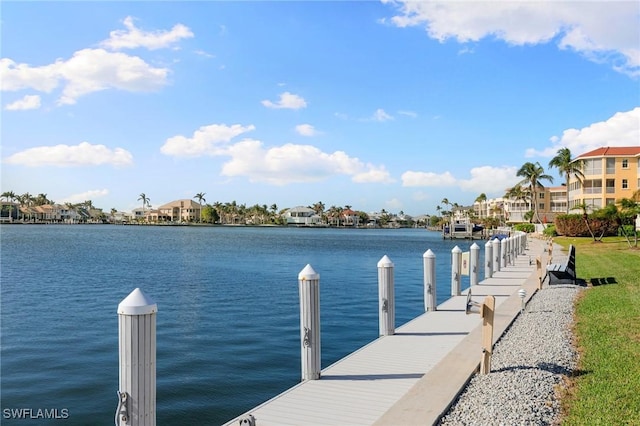730 W Elkcam Cir Unit 205, Marco Island, FL 34145 - dock area with a water view and a residential view