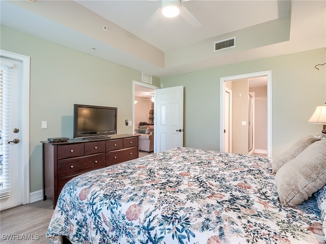 bedroom featuring ceiling fan and light hardwood / wood-style flooring