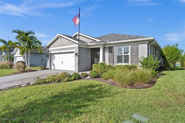 single story home with a garage and a front yard