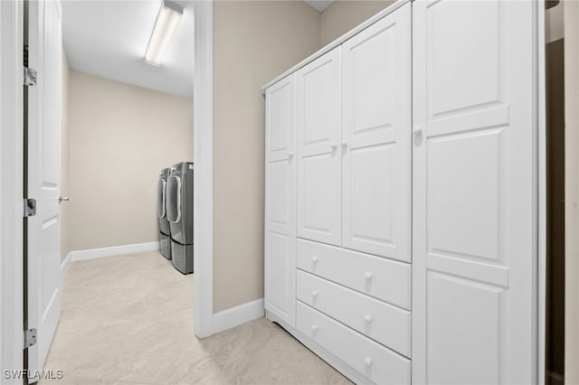 interior space featuring washer and clothes dryer