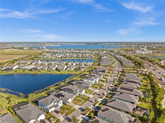 drone / aerial view with a water view