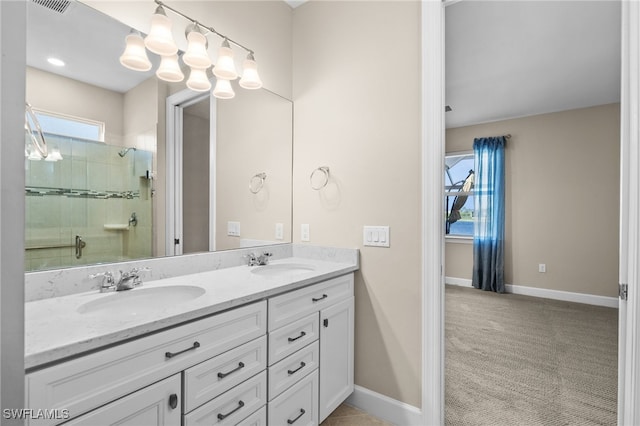 bathroom featuring walk in shower and vanity