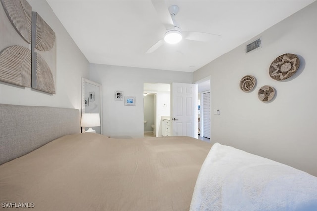 bedroom with ceiling fan and ensuite bathroom